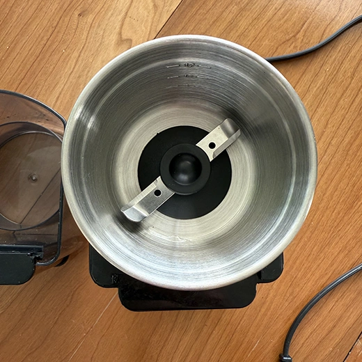 Inside the Cuisinart coffee grinder bowl.